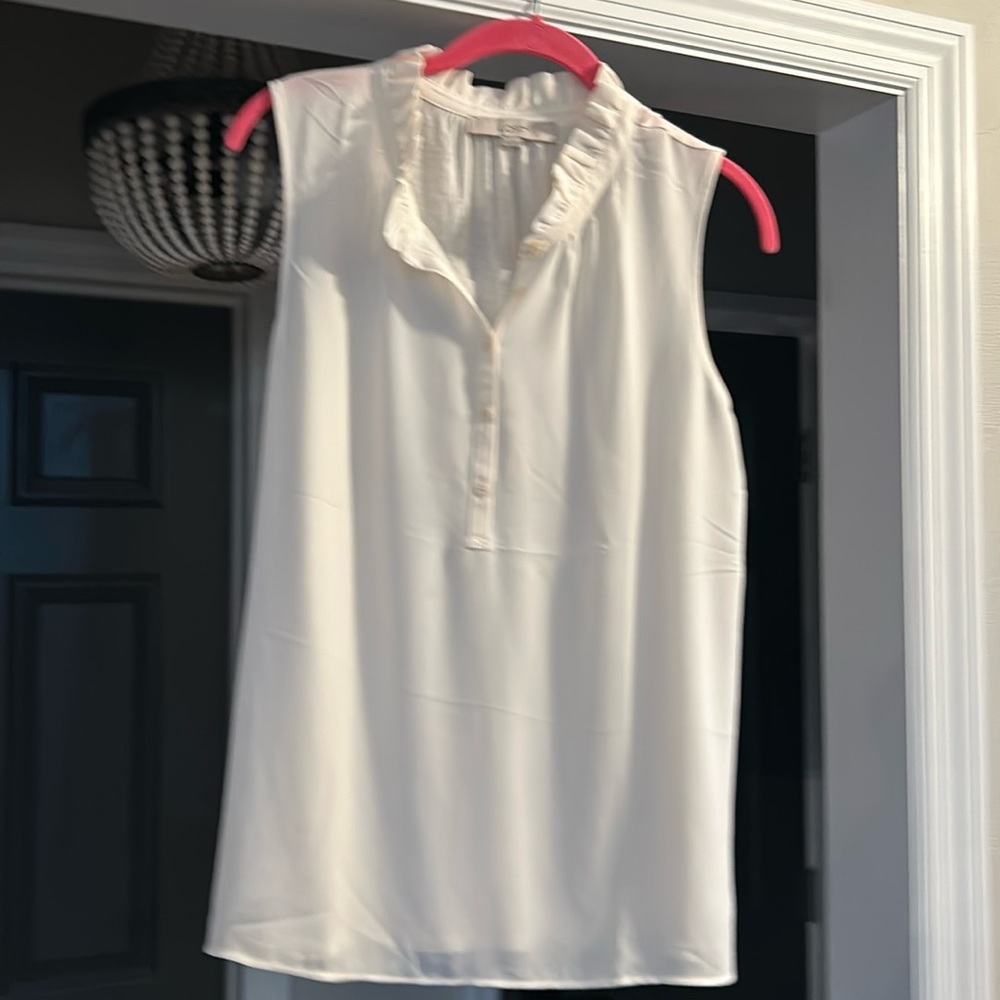 Sleeveless shell in cream size medium